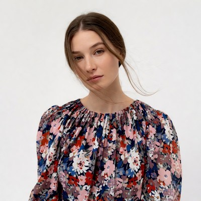 Woman in floral blouse portrait