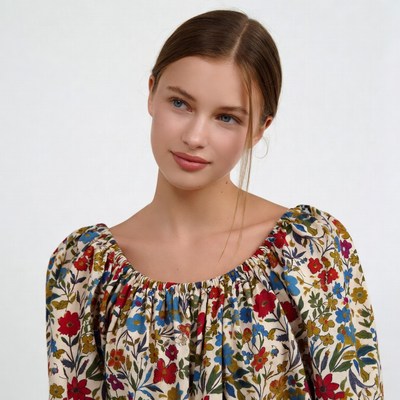 Young woman in floral blouse