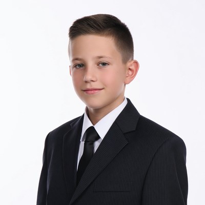Young boy in black suit