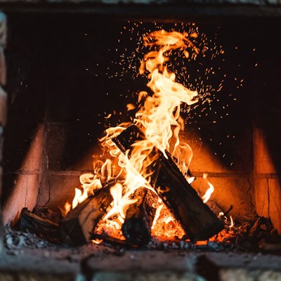 Blazing Fire in Brick Fireplace