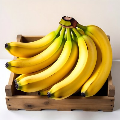 Bunch of ripe bananas in wooden crate