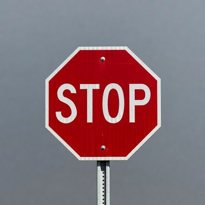 Red Stop Sign on Pole