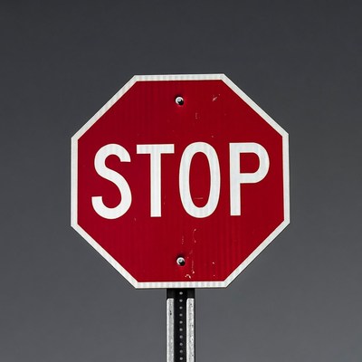 Red Stop Sign on Pole