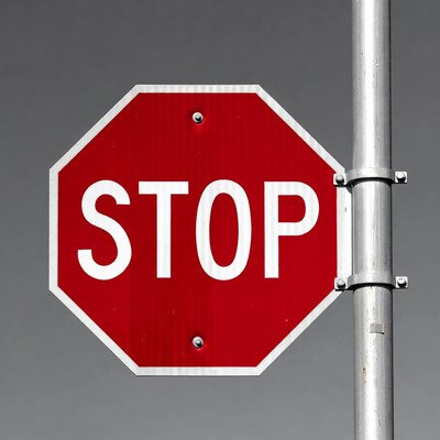 Red Stop Sign on Pole