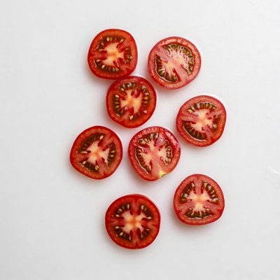Sliced Tomatoes on White Background