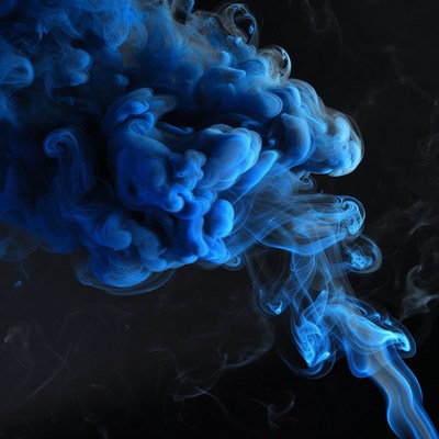 Blue smoke swirling on black background