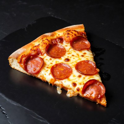 Pepperoni Pizza Slice on Black Slate