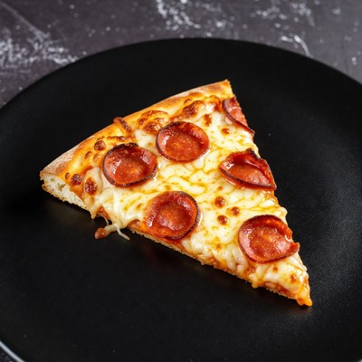 Pepperoni Pizza Slice on Black Plate