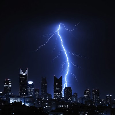 Lightning striking city skyline at night