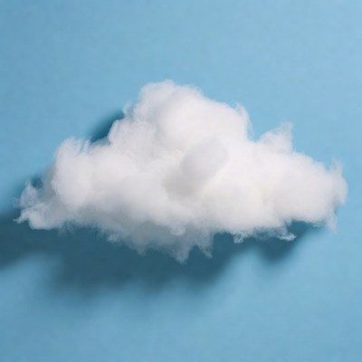 Fluffy white cloud on blue background