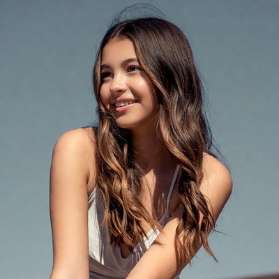 Smiling girl with long wavy hair