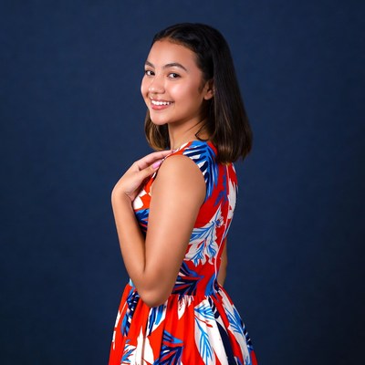 Asian girl smiling in floral dress
