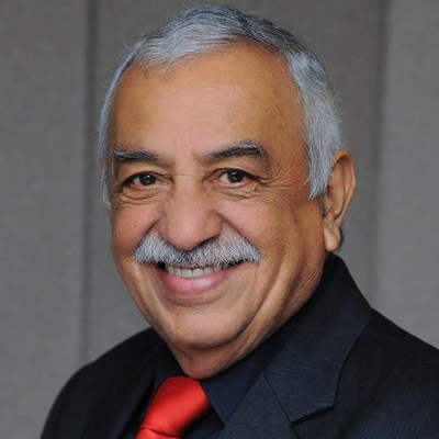 Smiling elderly man in suit