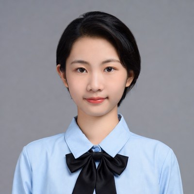 Asian woman in blue shirt with bow tie