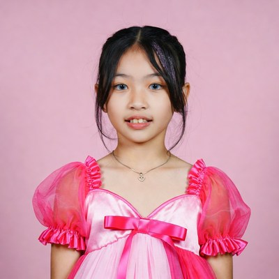 Asian girl in pink princess dress