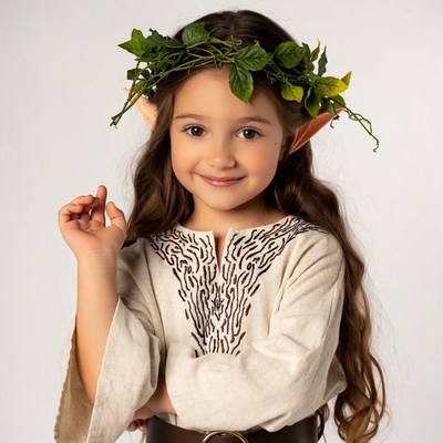 Girl in elf costume with leaf crown