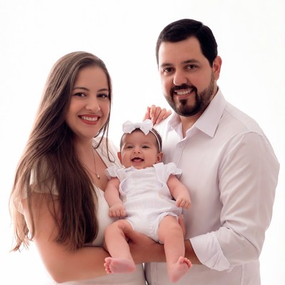 Family holding smiling baby