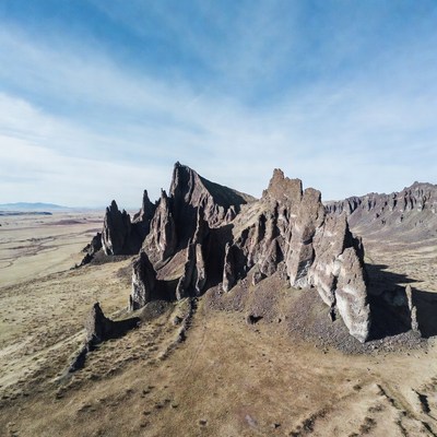 Jagged Rock Formation in Desert Landscape