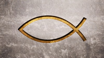 Golden Ichthys Symbol on Gray Wall