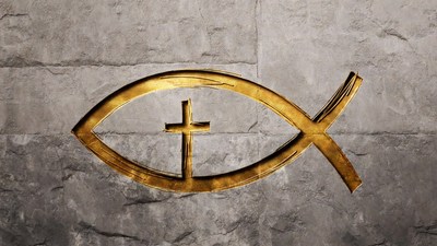 Gold Ichthys Fish with Cross on Stone Wall