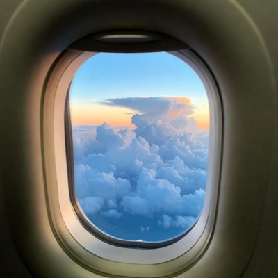 Airplane Window View of Clouds