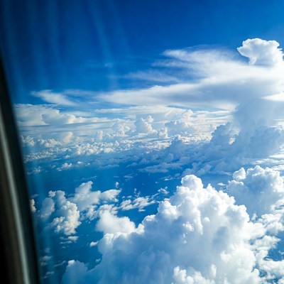 Airplane Window View of Clouds