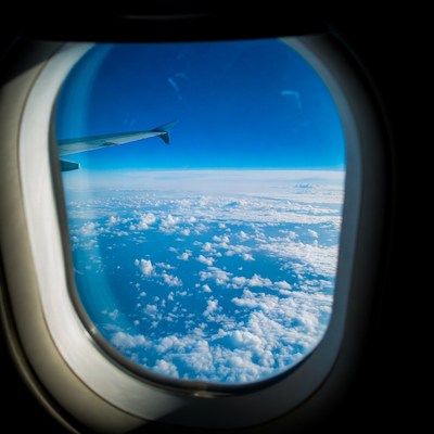 Airplane Window View of Clouds