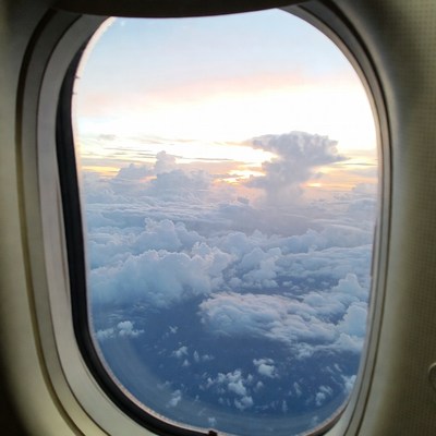 Airplane Window Sunset Clouds View