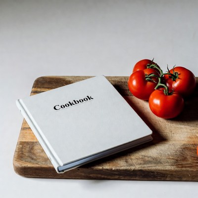 Cookbook with Fresh Tomatoes