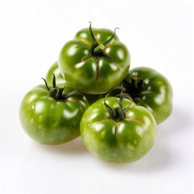 Stack of fresh green tomatoes