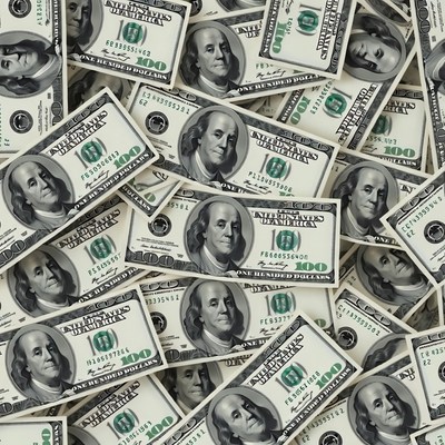 Pile of US Hundred Dollar Bills