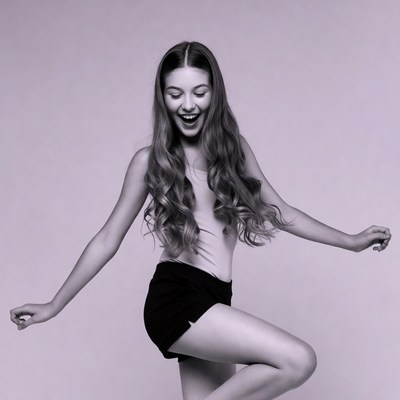 Teen girl dancing joyfully