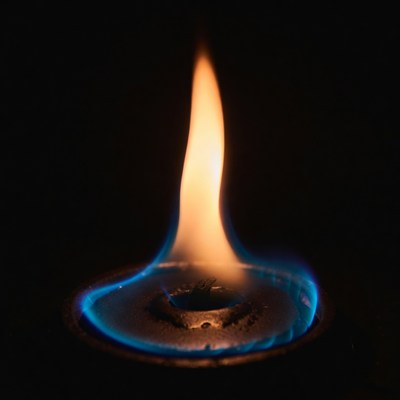 Burning Flame in Metal Bowl