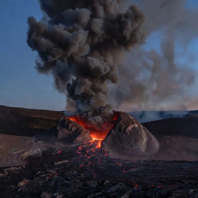 Volcano erupting with lava flows