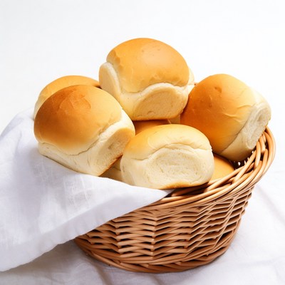 Fresh Dinner Rolls in Wicker Basket