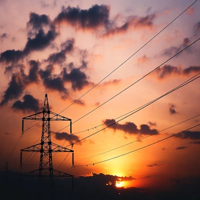 Electricity Pylon Silhouette at Sunset