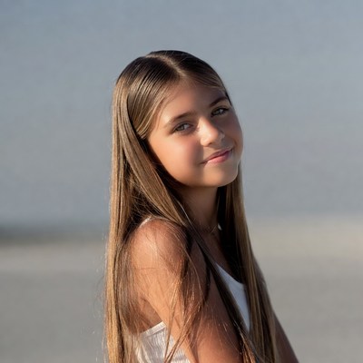 Smiling girl with long brown hair