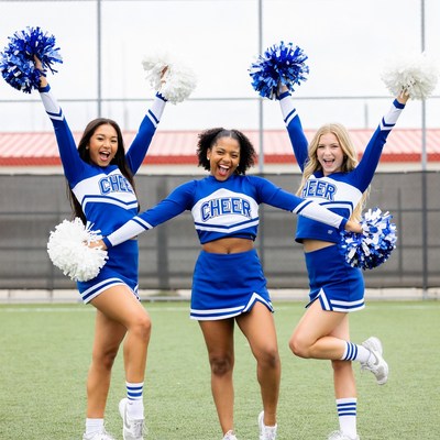 Three cheerleaders posing with pom poms