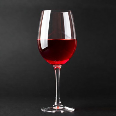Red Wine Glass on Black Background