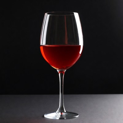 Red Wine Glass on Black Background