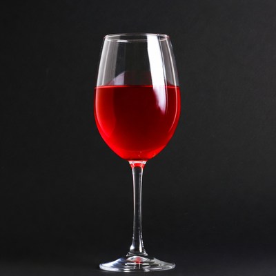 Red Wine Glass on Black Background