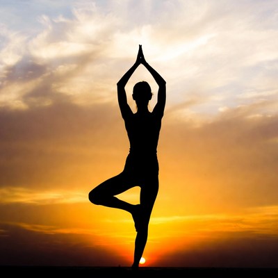 Woman in Tree Pose Silhouette at Sunset