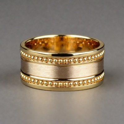 Gold wedding band with beaded edges