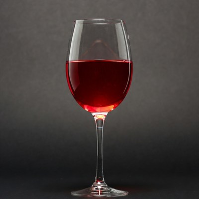 Red Wine Glass on Dark Background