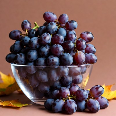 Purple Grapes in Glass Bowl