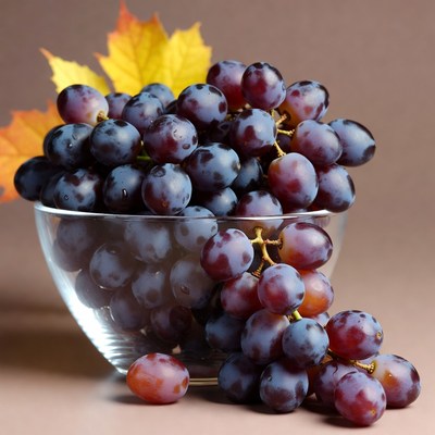 Purple Grapes in Glass Bowl