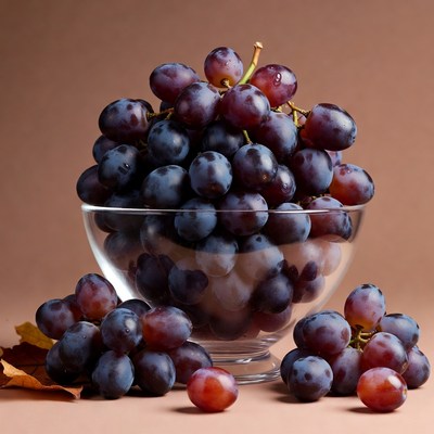 Bunch of Purple Grapes in Glass Bowl