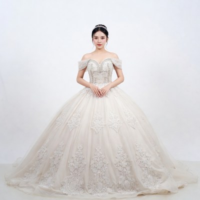 Asian woman in white lace wedding dress