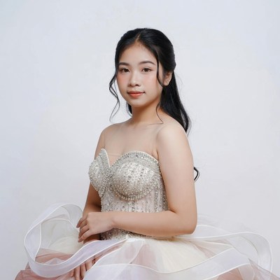 Asian girl in beaded strapless gown