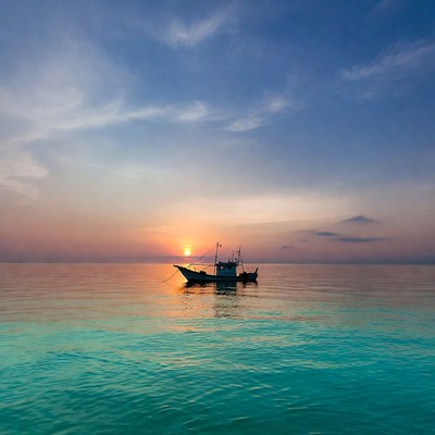 Fishing Boat at Sunset